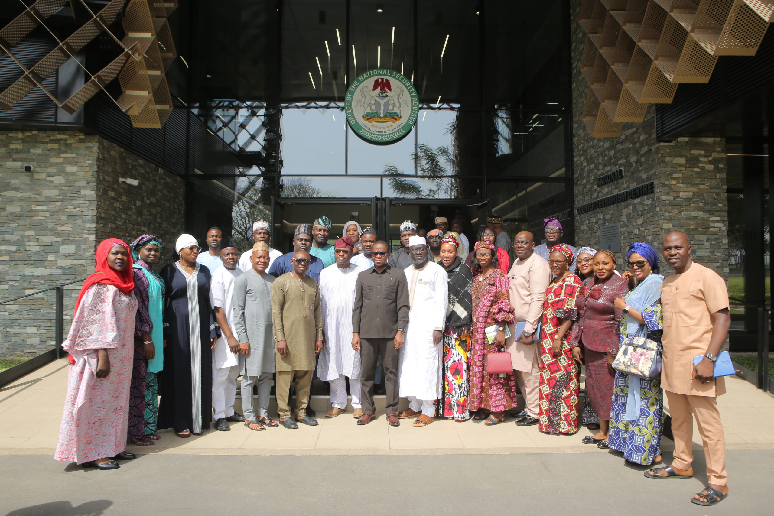 The National Coordinator, National Counter Terrorism Centre, Rear Admiral YEM  Musa (rtd), in a group Photograph with the visiting Director and PhD Students Inst. for Governance and Strategic Studies, NSUK  